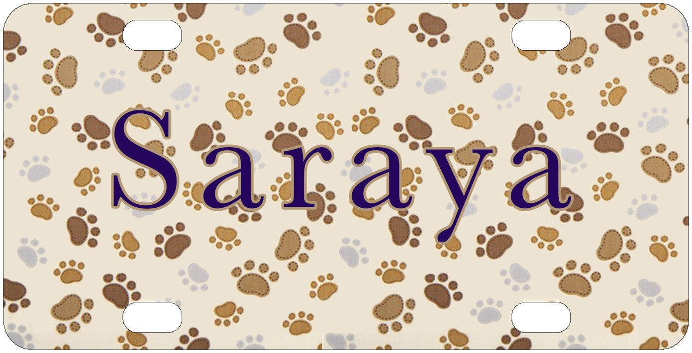 Paw Prints license plate design; sample names shown