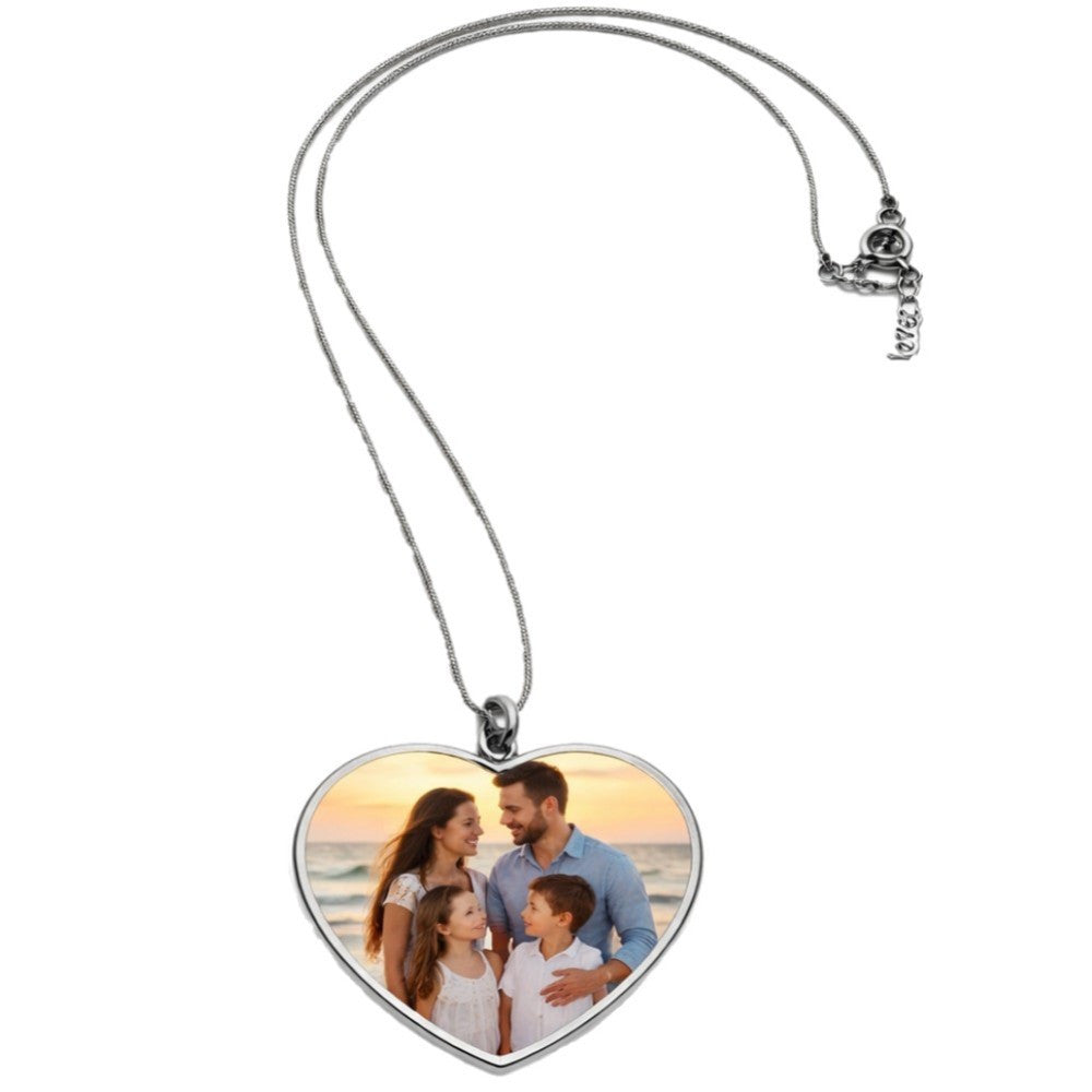 Silver-tone heart photo necklace showing a sample family photo